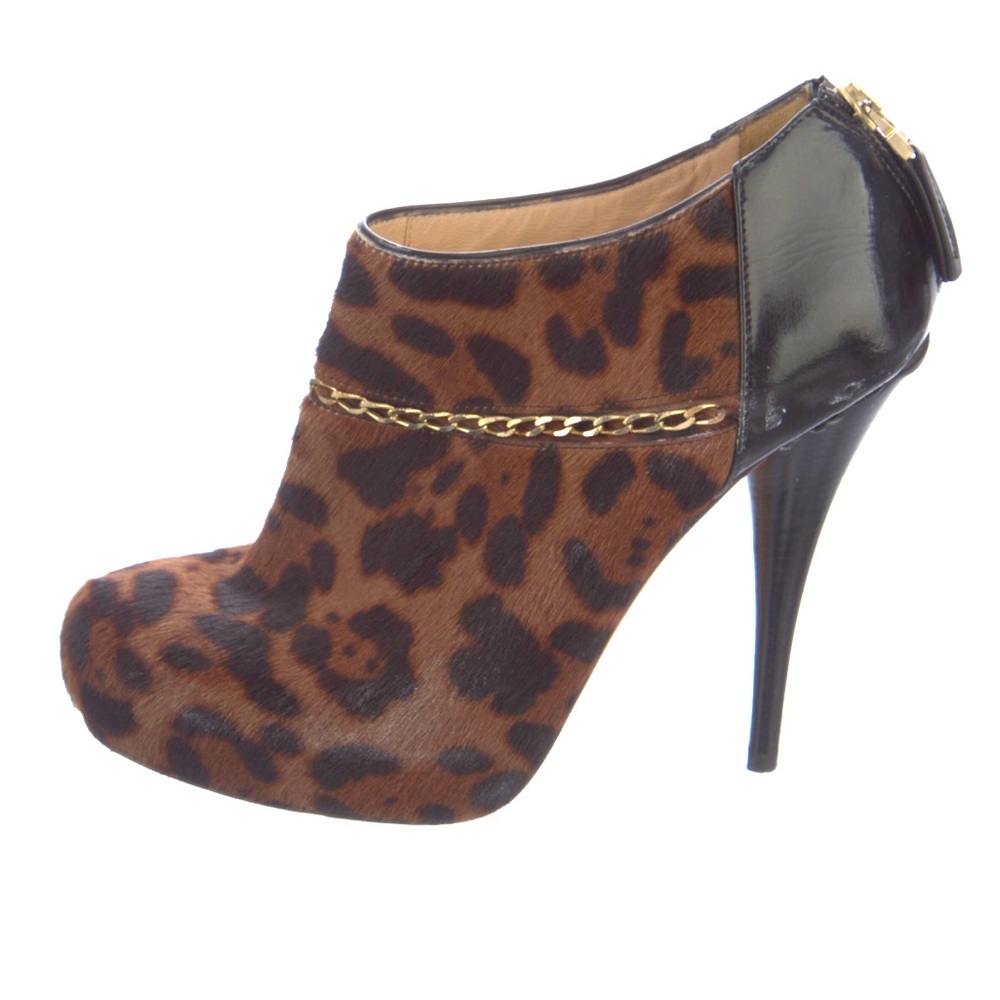 FENDI Animal print pony hair and black leather booties with gold chain accent